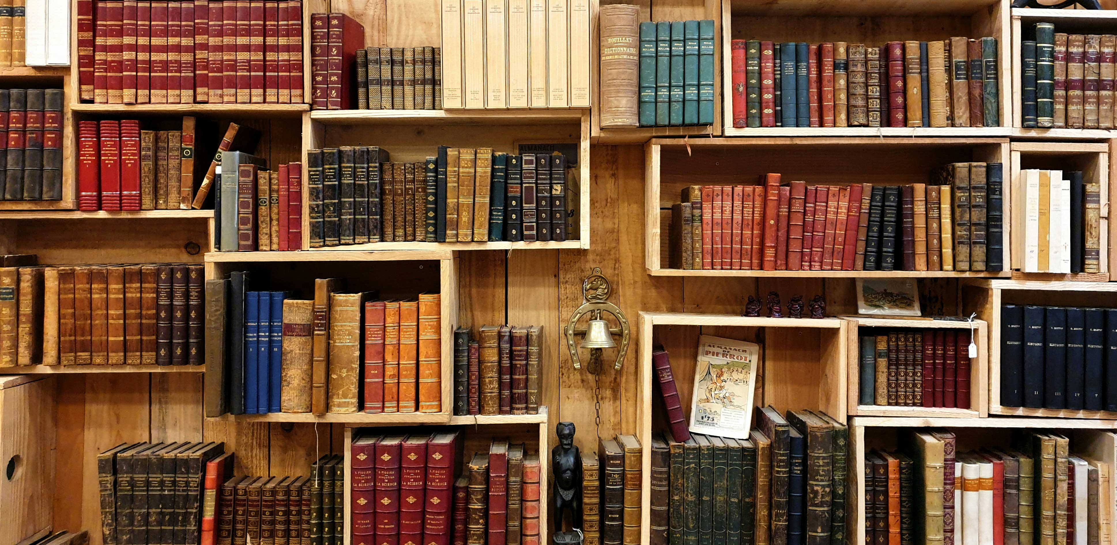 A photo of books on a bookshelf.